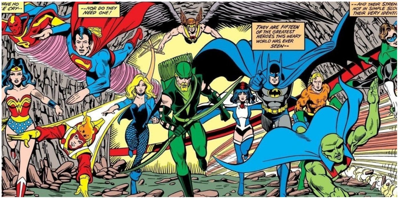 the satellite era justice league roster running down a cave together in DC comics
