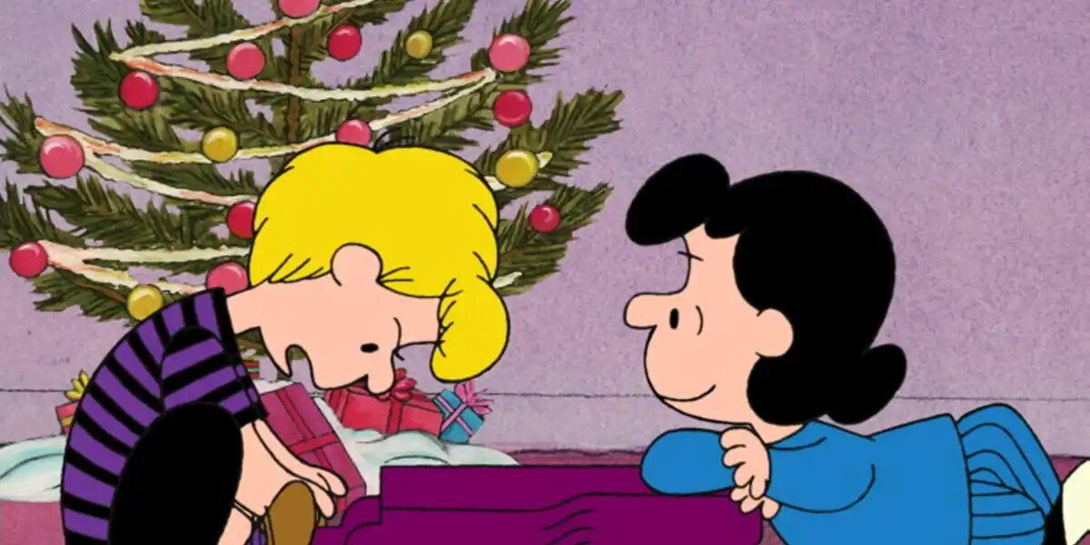 Schroeder is playing the piano as Lucy talks to him in the Christmas Special