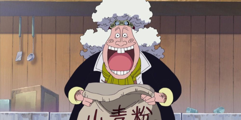 One Piece's Wanze the noodle warrior with an open-mouthed, toothy grin