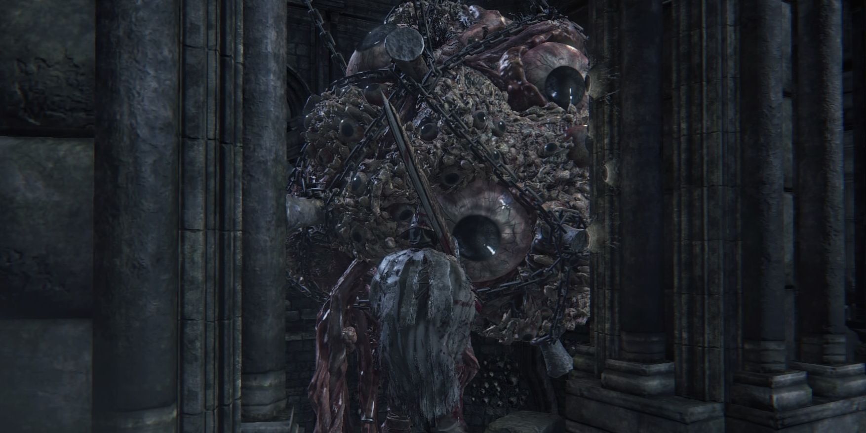 The Hunter faces down the Brain of Mensis in Bloodborne.