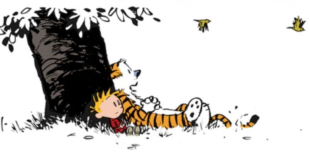 Calvin and Hobbes relax against a tree after finding a dead bird