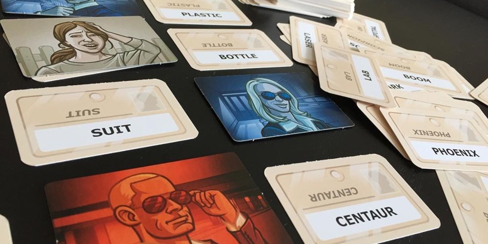 A selection of covered and uncovered words in Codenames game