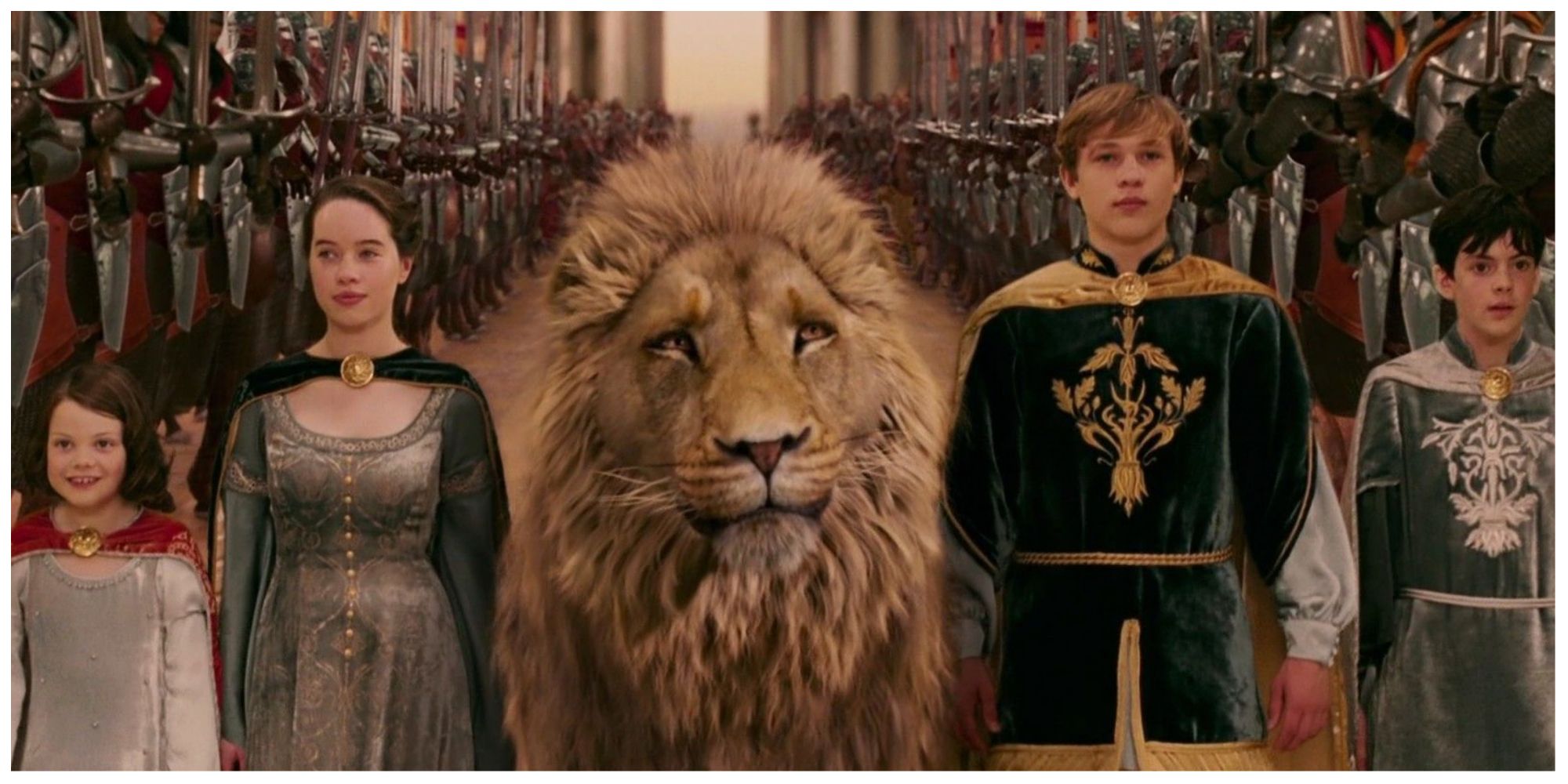 Aslan with the Pevensie children: Lucy, Susan, Edmund, and Peter