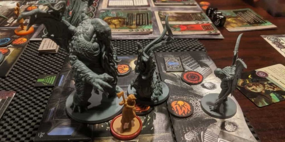 An investigator facing off with monsters in Cthulhu: Death May Die game.