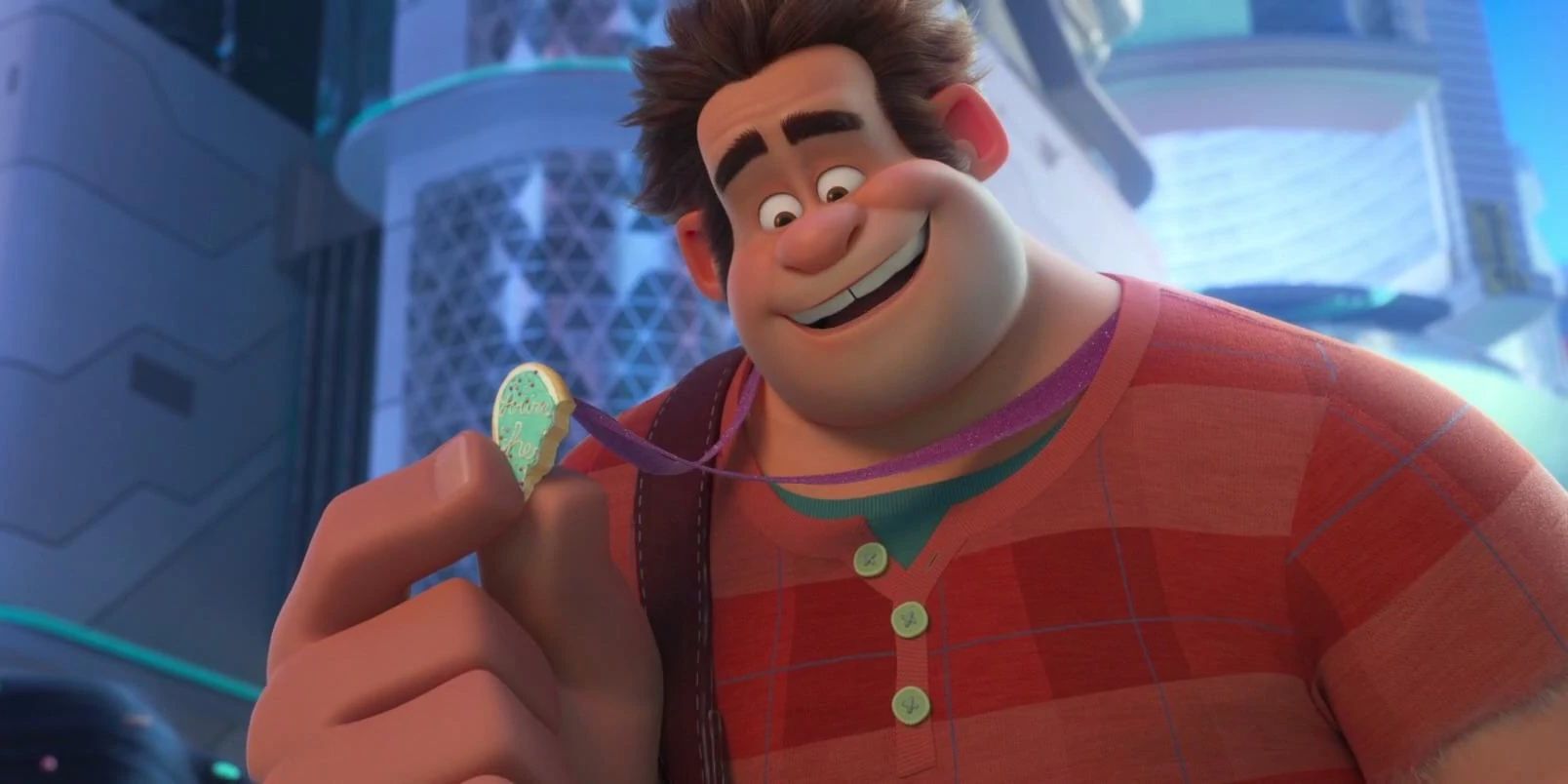 Disney's Wreck-It Ralph admires the medal Vanellope gave him