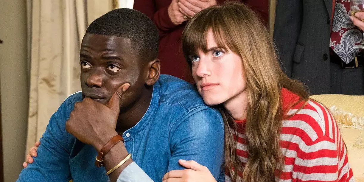 Rose and Chris on the couch in Get Out