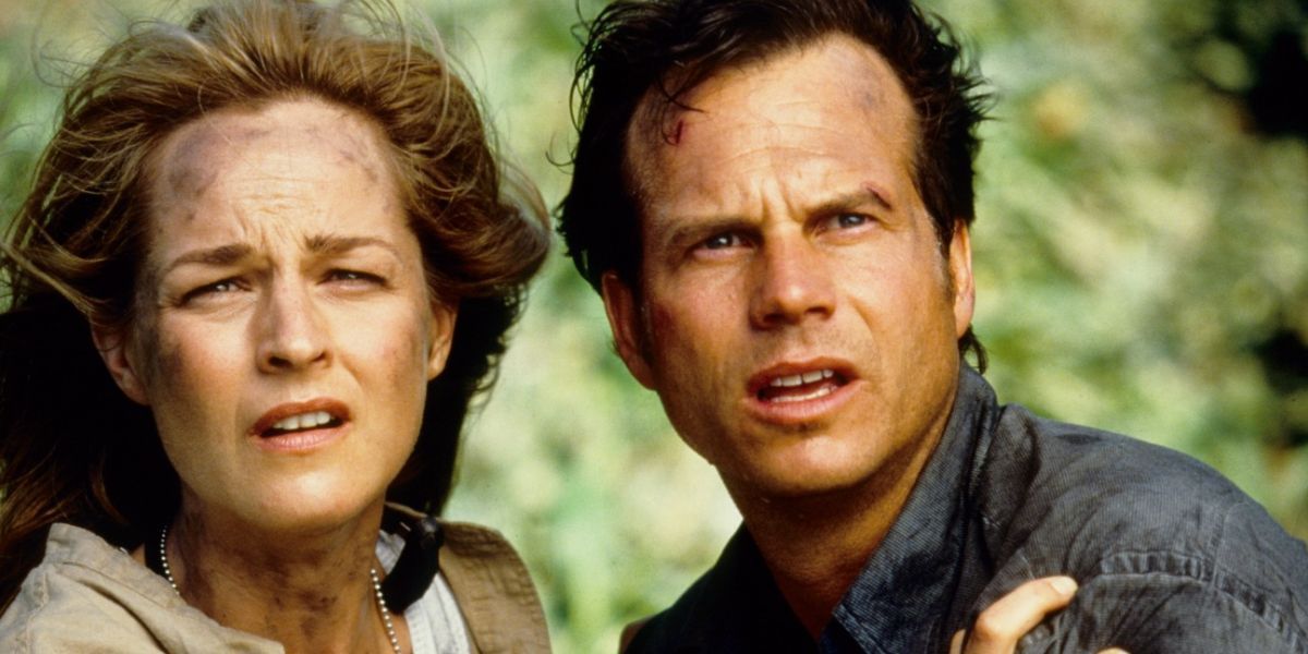 Helen Hunt and Bill Paxton looking onwards in the 1996 tornado thriller, Twister