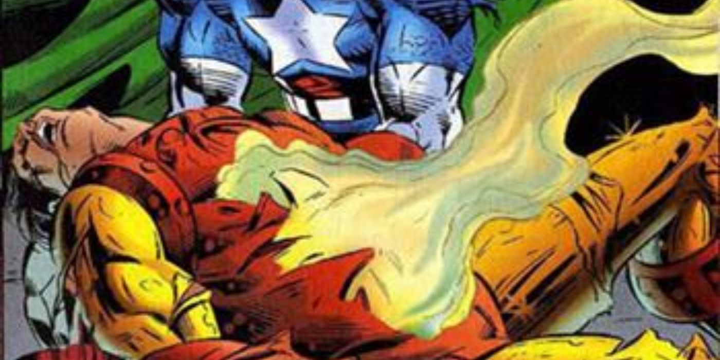 Iron Man's body lies smoking in Captain America's arms in Marvel Comics