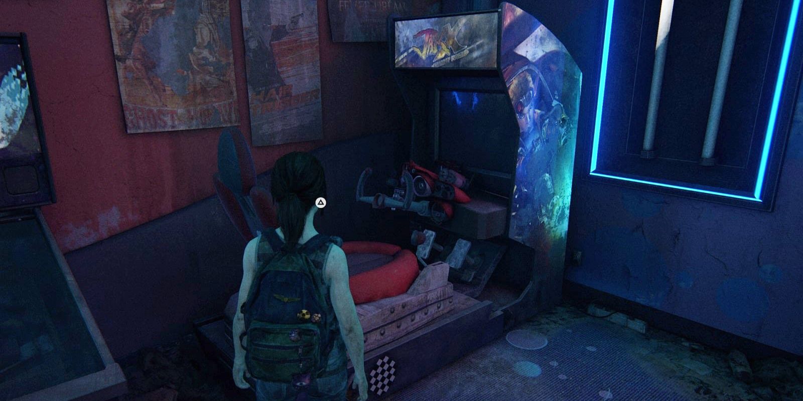 Ellie approaching the Jak X Combat Racing arcade cabinet in The Last of Us: Left Behind.