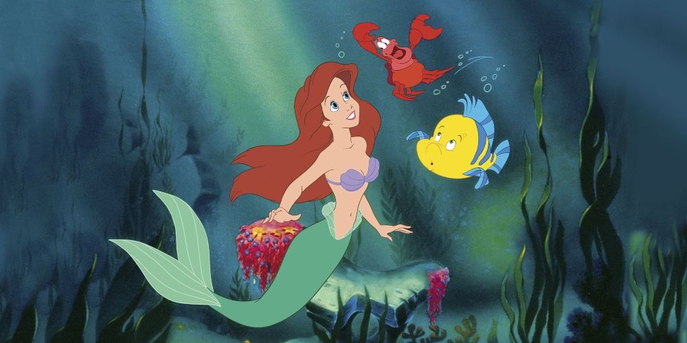 Ariel, Sebastian and Flounder in the ocean in The Little Mermaid