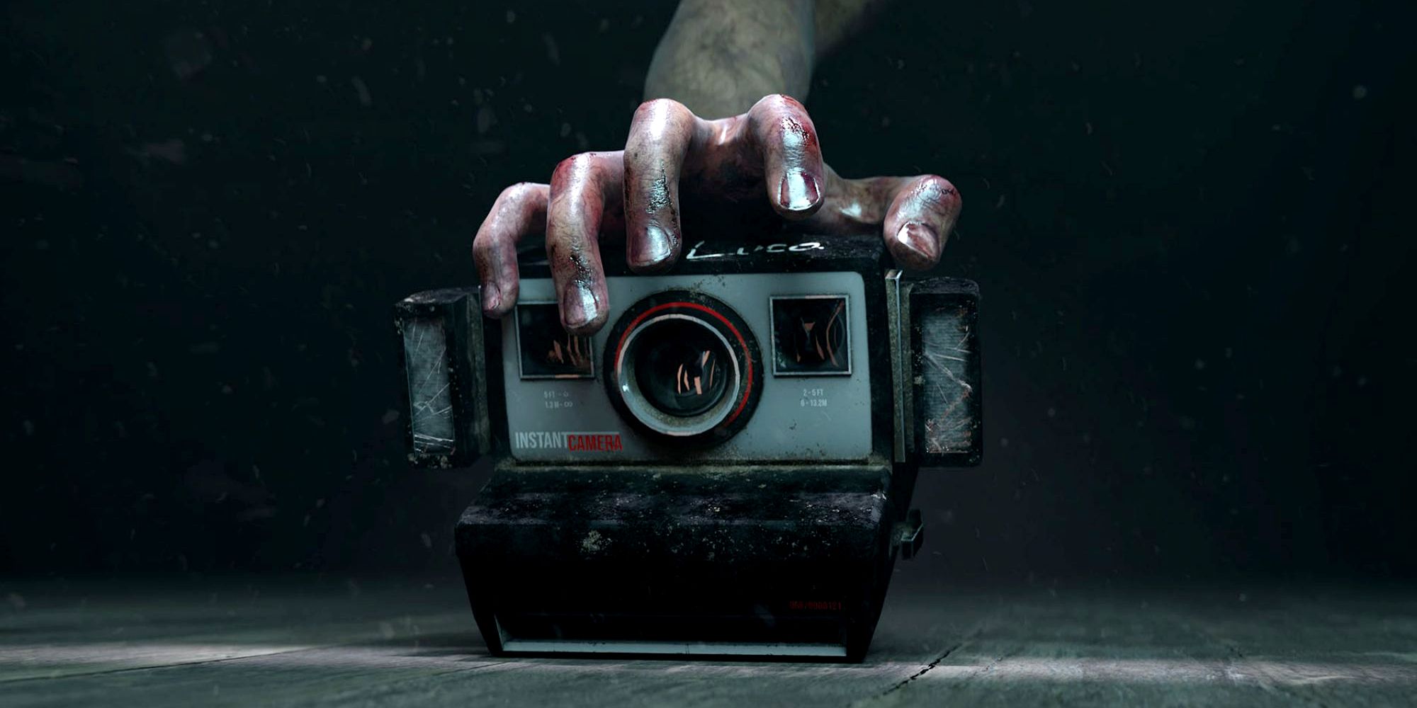 MADiSON Promotional Art with a hand and a camera. 