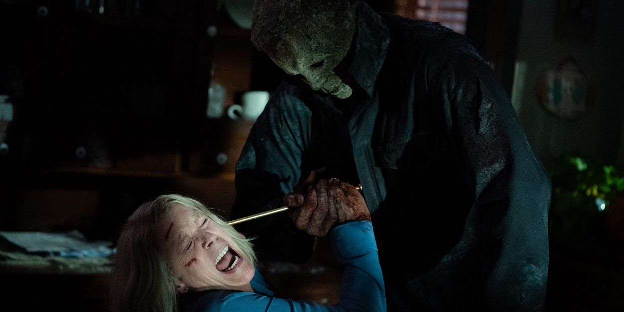 Michael Myers pushing a knitting needle in Laurie Strode's ear in 2022's Halloween Ends