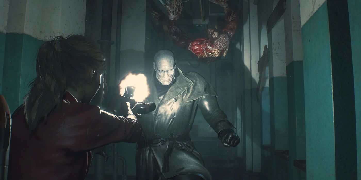 Mr. X attacking Claire Redfield in Resident Evil 2.