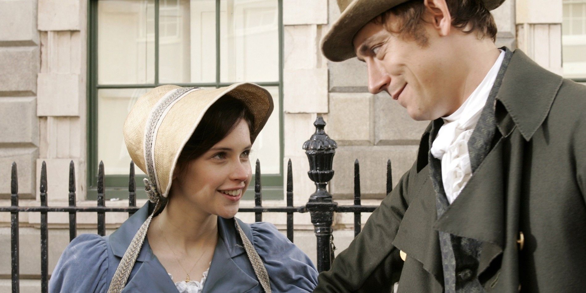 Catherine Morland and Henry Tilney smile at each other in Northanger Abbey