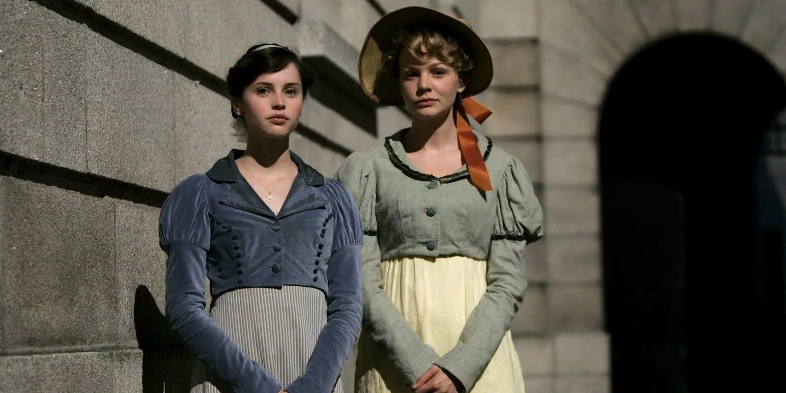 Felicity Jones as Catherine Morland and Carey Mulligan as Isabella in Northanger Abbey