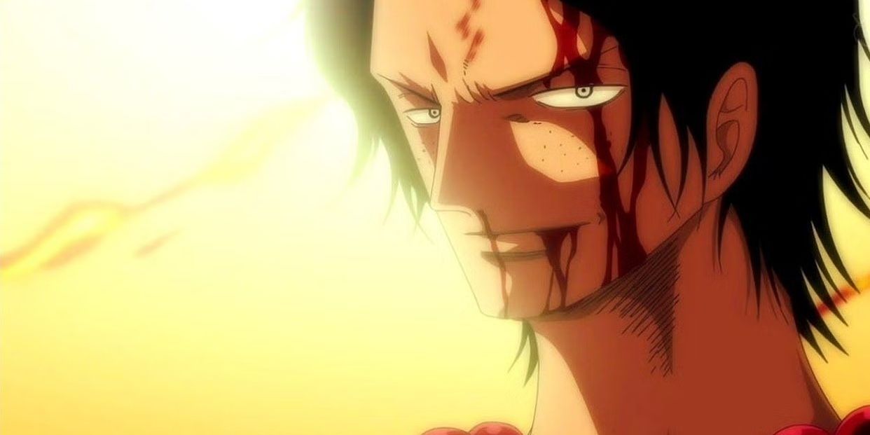 A close-up of Ace with blood on his face in the One Piece anime
