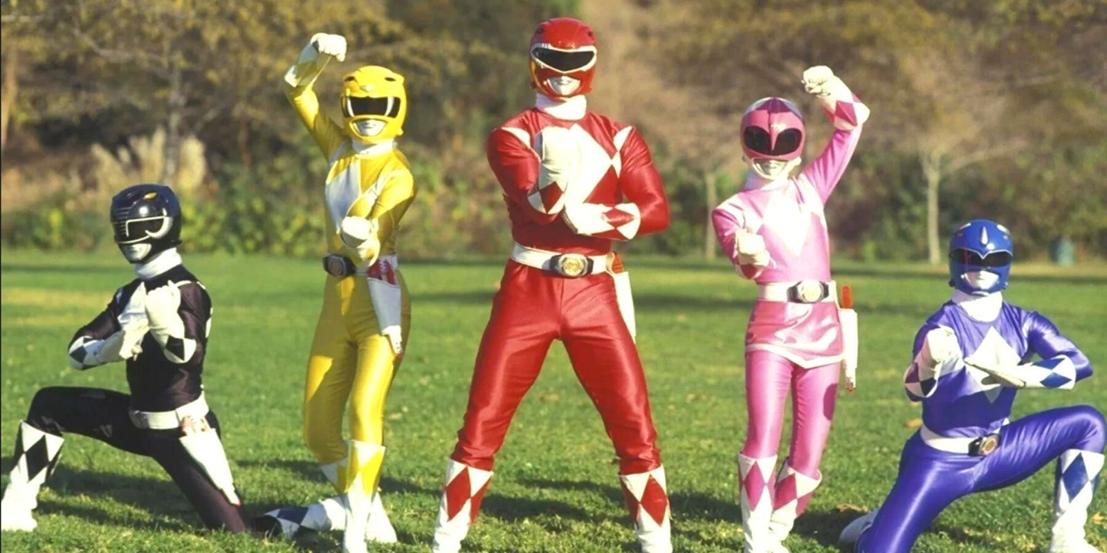 The Might Morphin' Power Rangers striking their unique battle poses