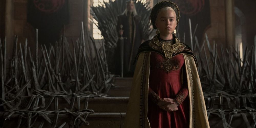 Rhaenyra Targaryen with King Viserys behind her in House of the Dragon