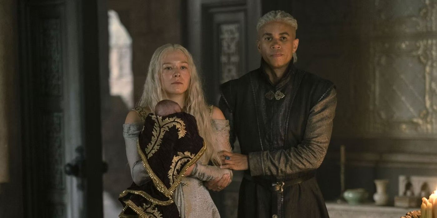 Rhaenyra in House of the Dragon holding a baby.