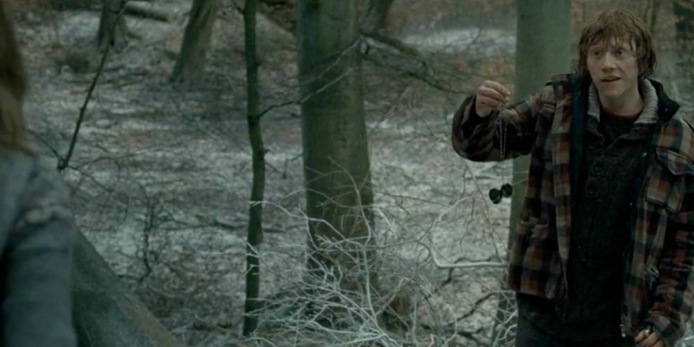 Ron holds the locket in Harry Potter and the Deathly Hallows.