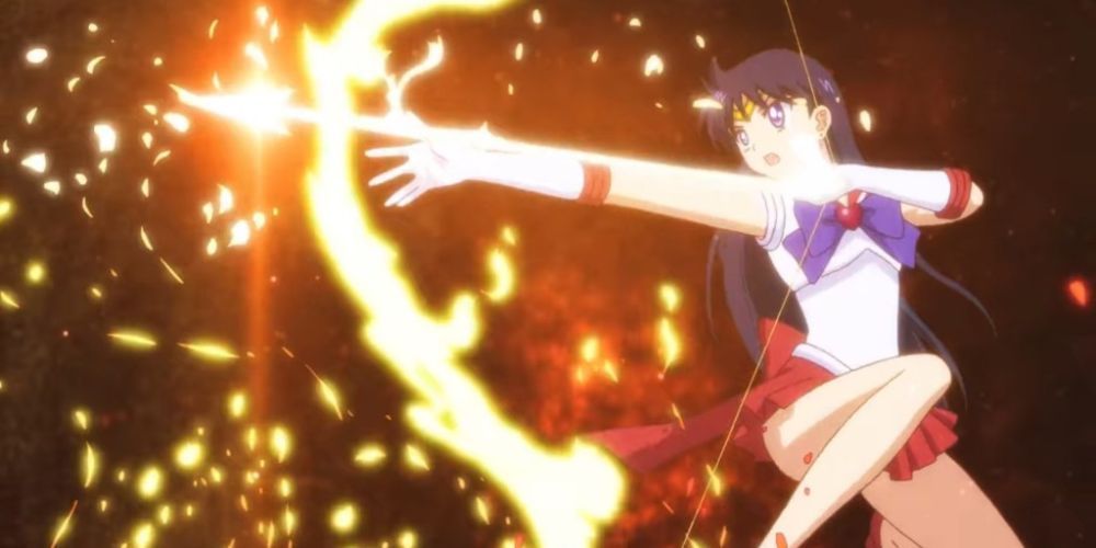 Sailor Mars draws a fiery bow and arrow, using Mars Flame Sniper in Sailor Moon.