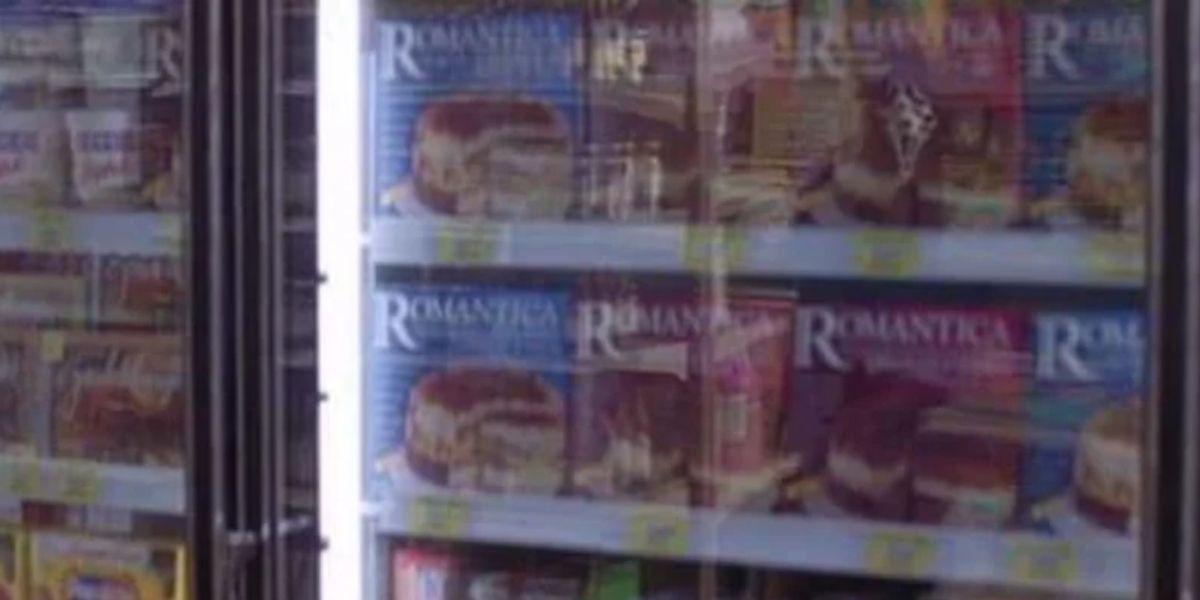 Ghostface reflection in the freezer doors at the grocery store in Scream