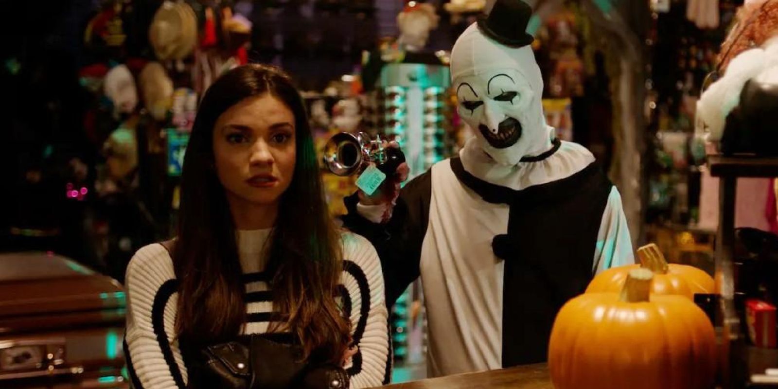 Sienna and Art the Clown in the Halloween Store