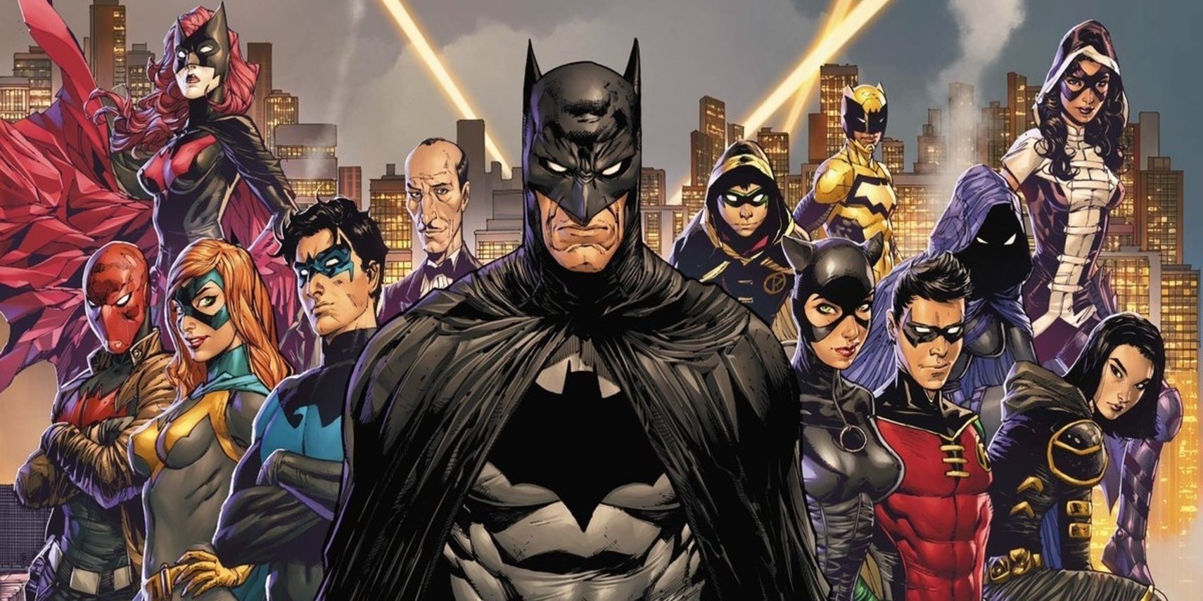 Batman standing with The Bat Family in DC Comics