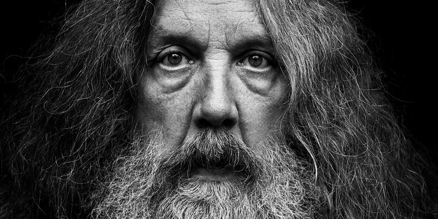 Watchmen co-creator and comics writer Alan Moore stares directly at the reader