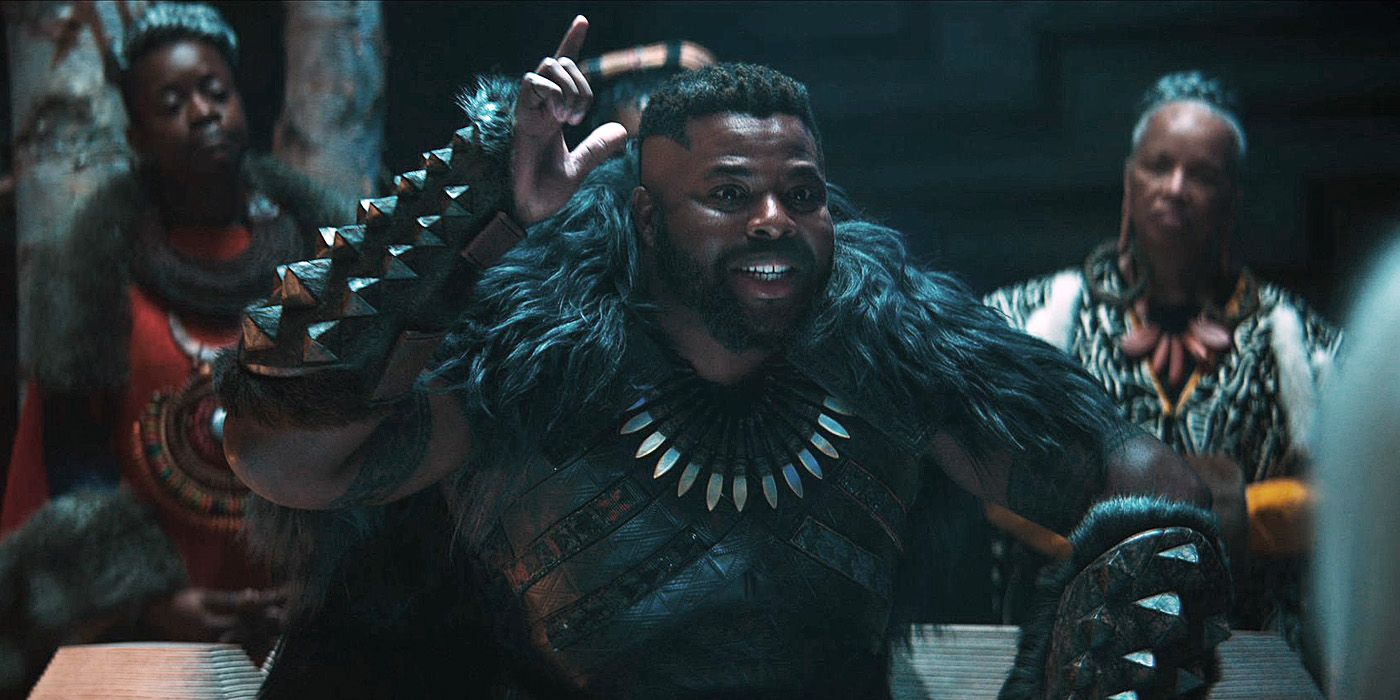 Winston Duke as M'Baku sitting on his throne