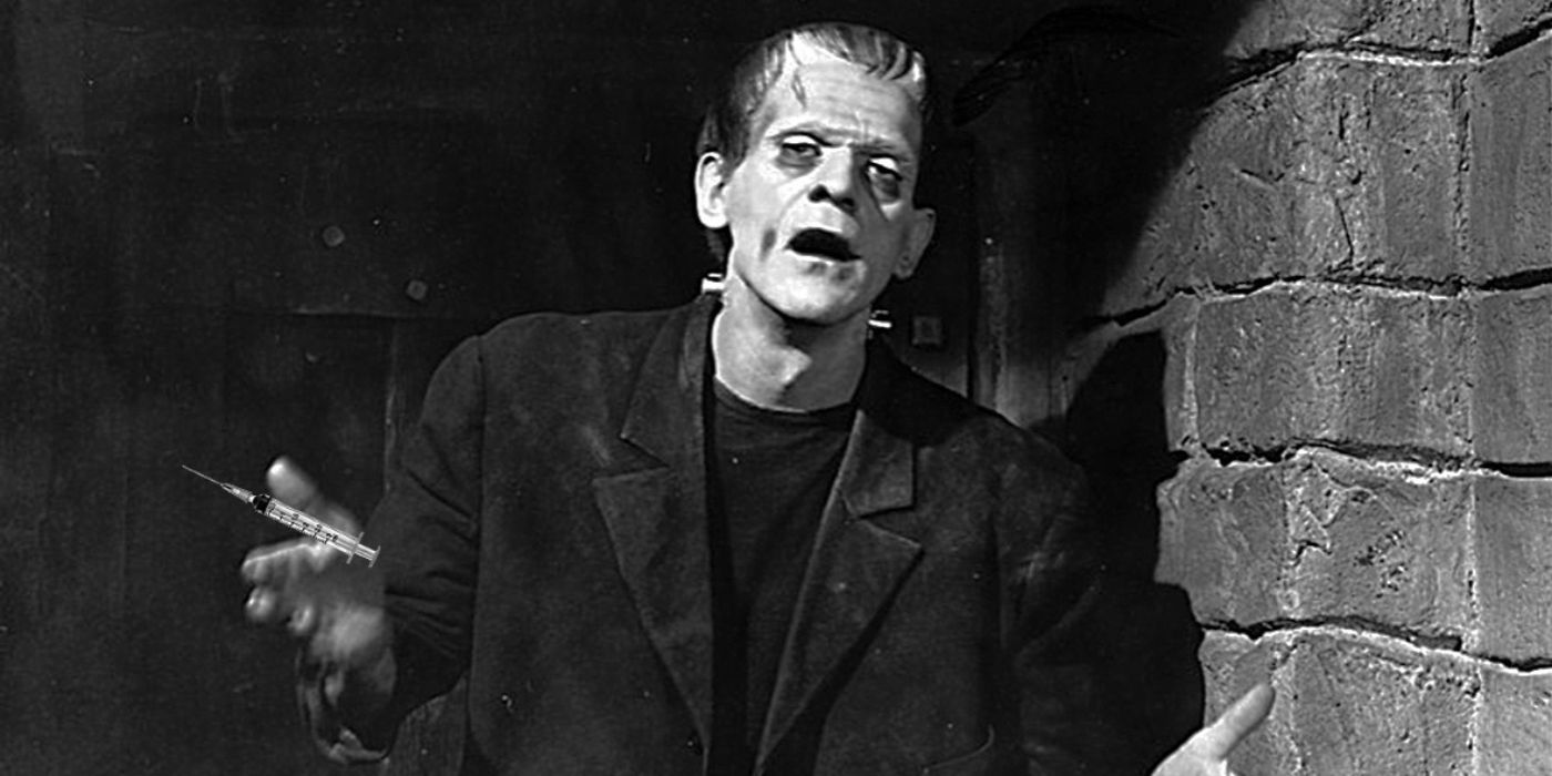 Frankenstein's monster as played by Boris Karloff holds a syringe