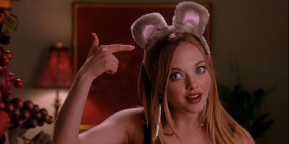 Karen Smith from Mean Girls points at her mouse ears.