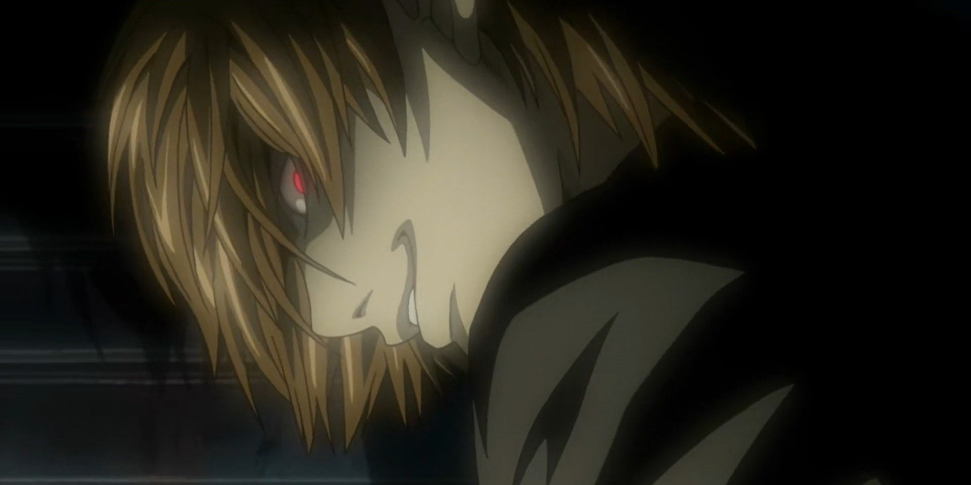 Light Yagami/Kira from Death Note looking over his shoulder.