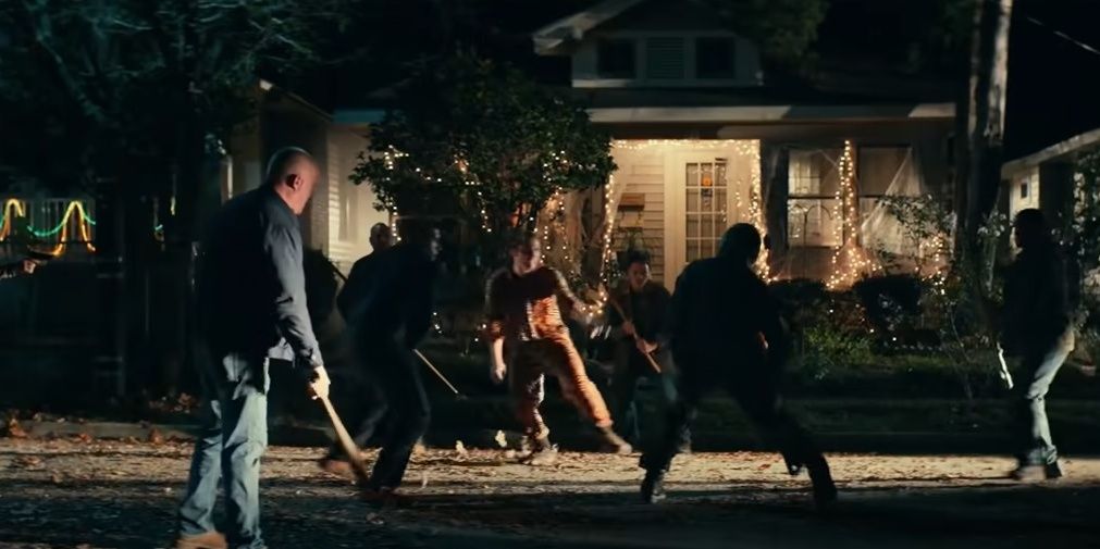 An angry mob attacks Michael Myers in Halloween Kills
