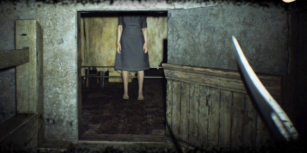 The ghost child in the bedroom sequence from Resident Evil 7.