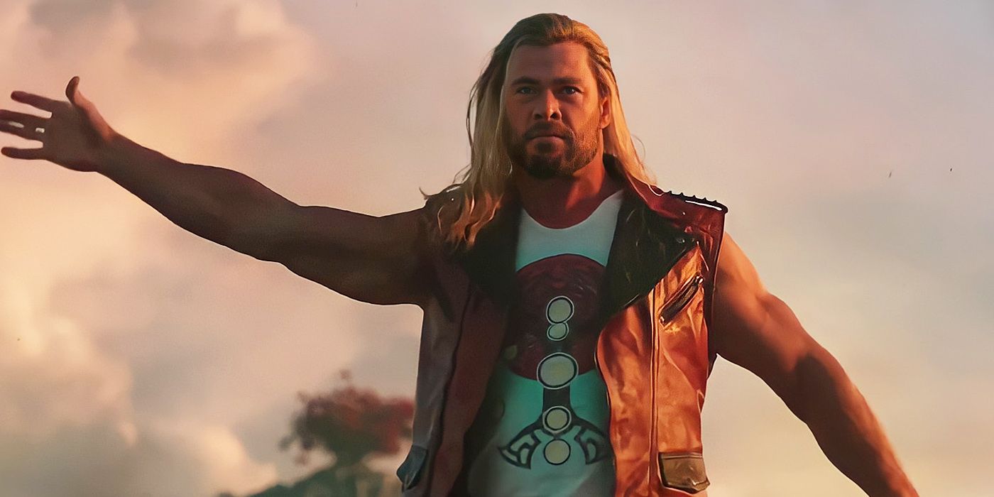 Chris Hemsworth as Thor in Thor Love and Thunder with arms spread.