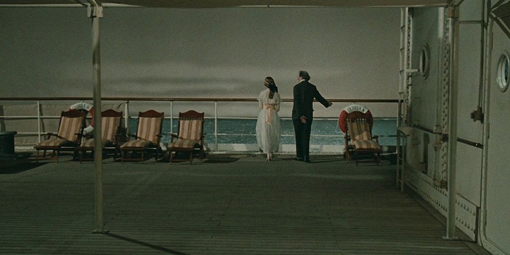 And the Ship Sails on by Fellini - shot of two characters on the deck of the ship, gazing out at the ocean