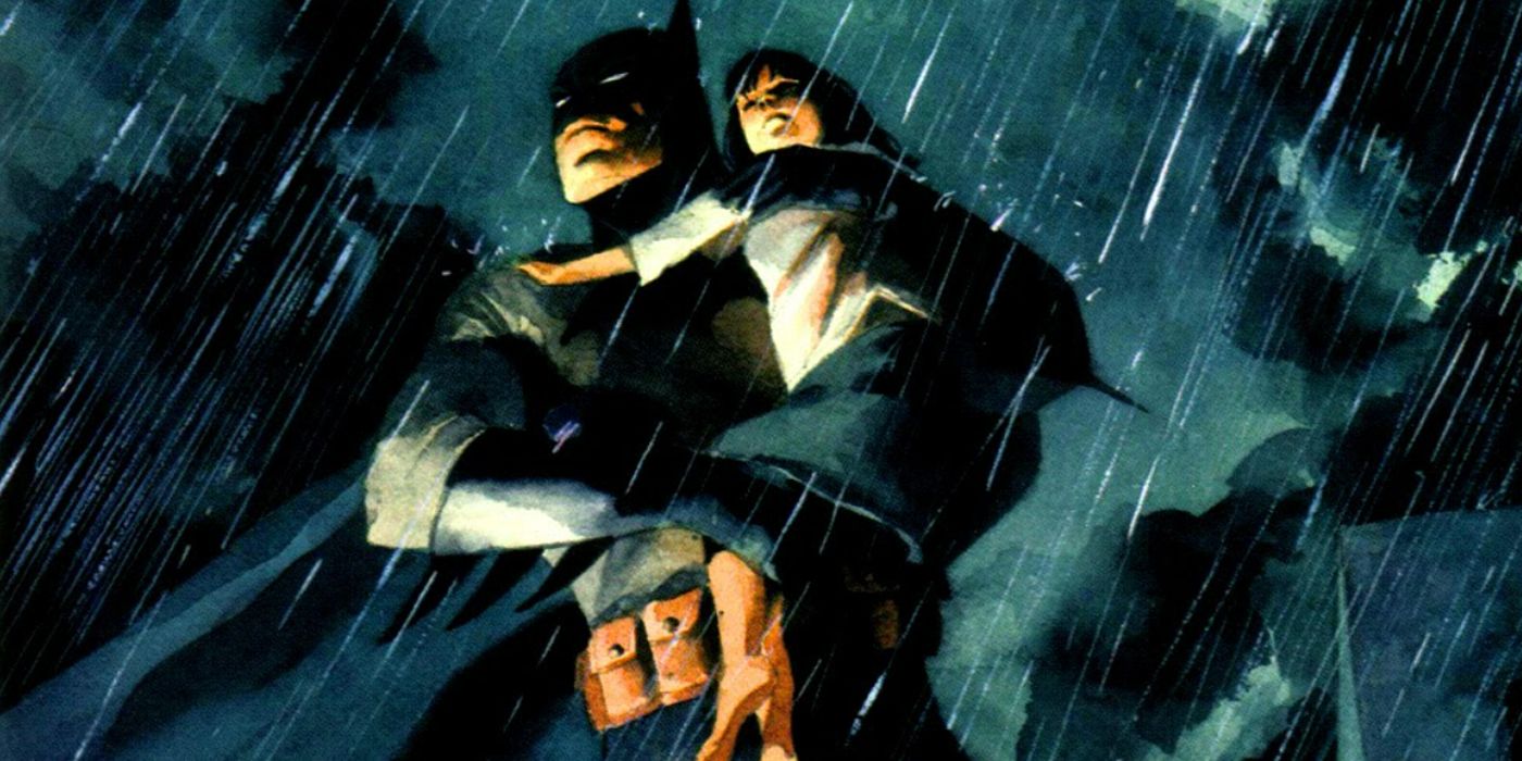 Batman holding a child during a monsoon in Batman: Absolution.