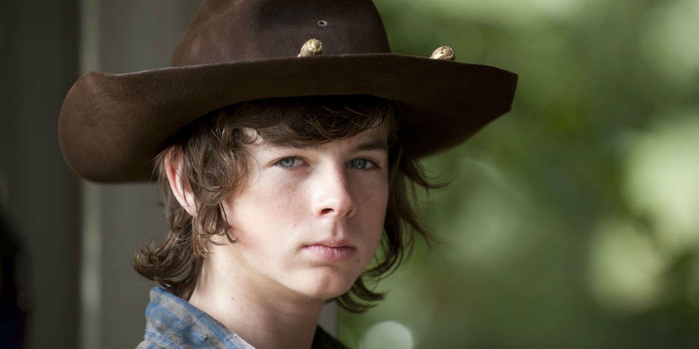 Carl Grimes wearing a Sheriff's hat in The Walking Dead