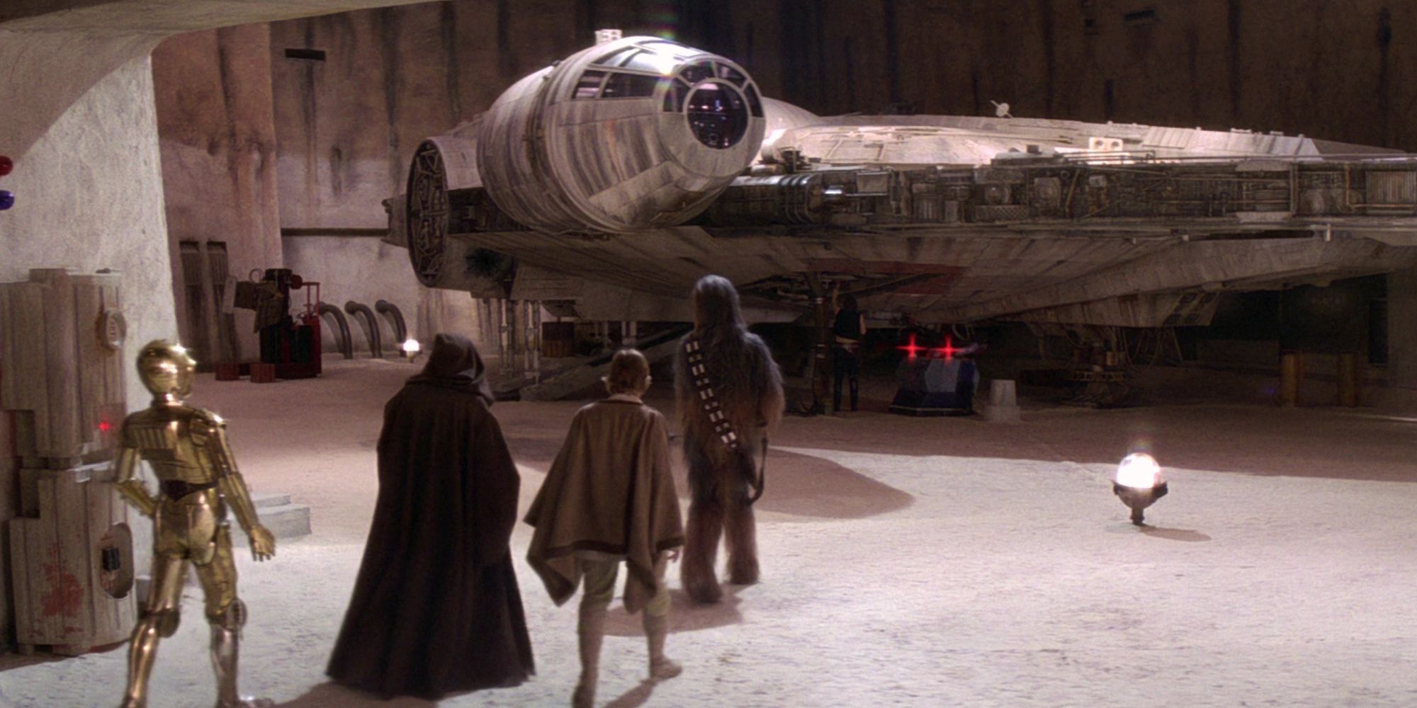 Luke Obi-Wan, C-3PO, and Chewie walking into Docking Bay 94 to meet Han in Star Wars Episode IV; A New Hope