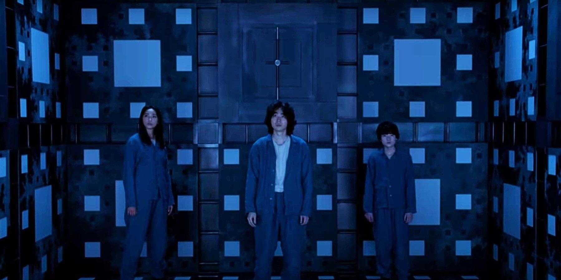 Prisoners assess their surroundings in 2021's Cube