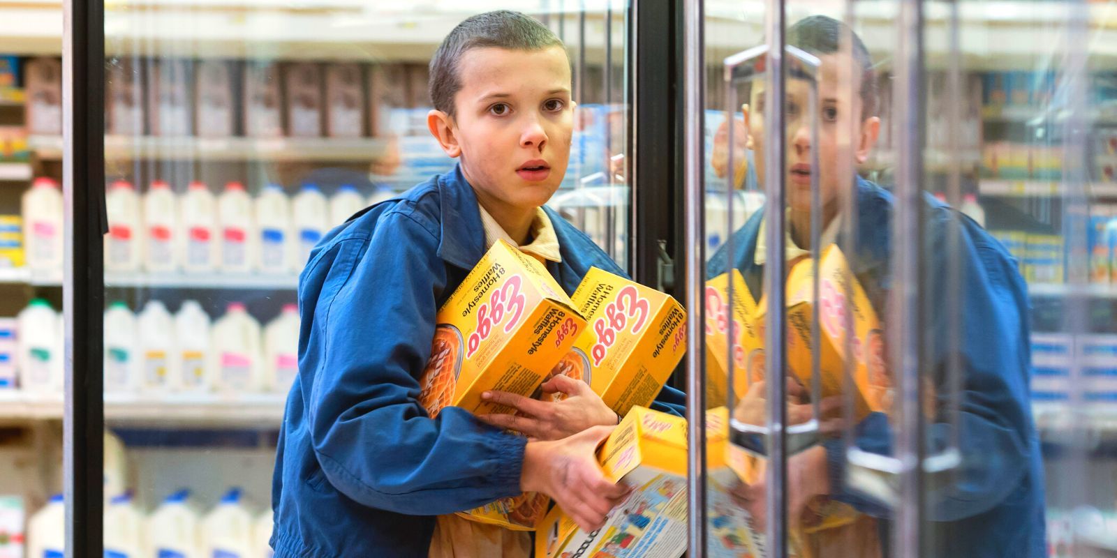 Stranger Things' Eleven as she pilfers an armful of Eggos