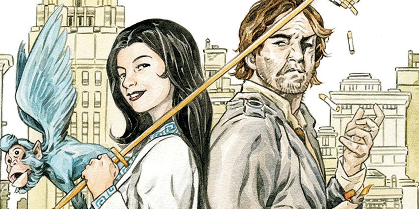 Snow White and Bigby standing back to back on Fables cover.