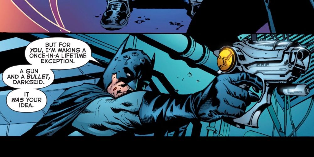Batman threatening Darkseid with a gun in DC Comics