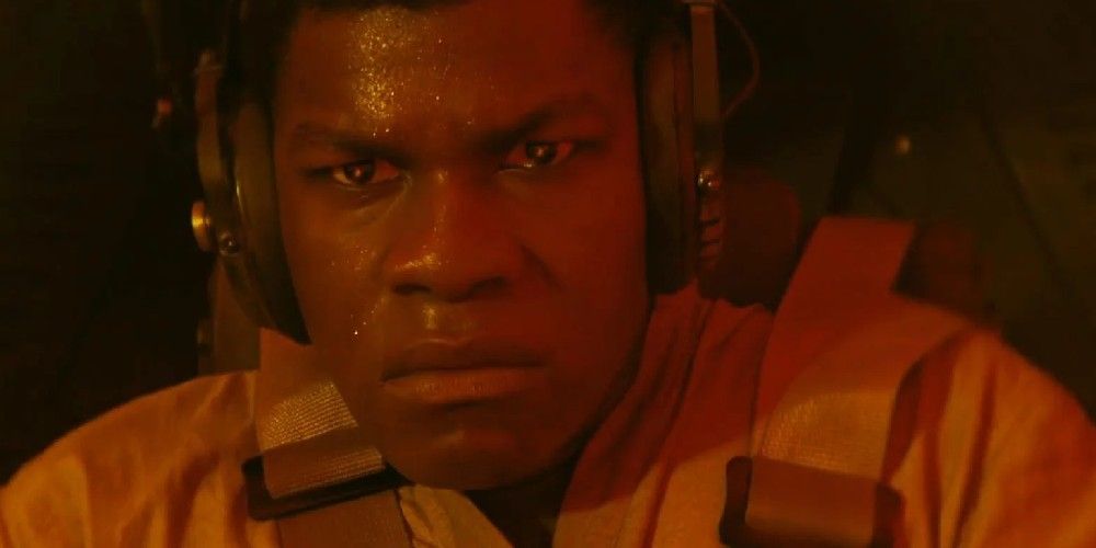 Finn charges at the siege cannon in Star Wars: The Last Jedi