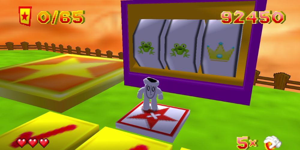 Glover standing on a pressure block staring at the camera with a slot machine in the background