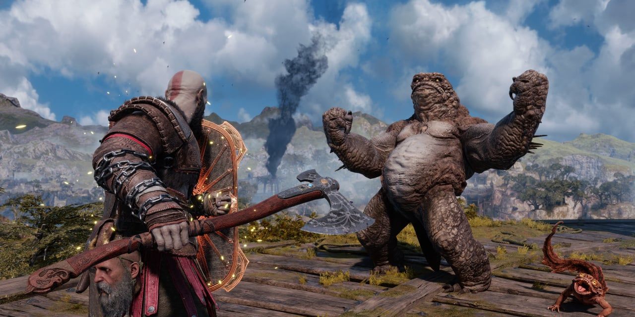 Kratos facing off against an amphibious enemy God of War Ragnarok