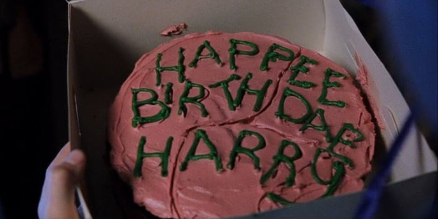 Harry Potter's birthday cake that reads "Hapee Birthdae Harry"