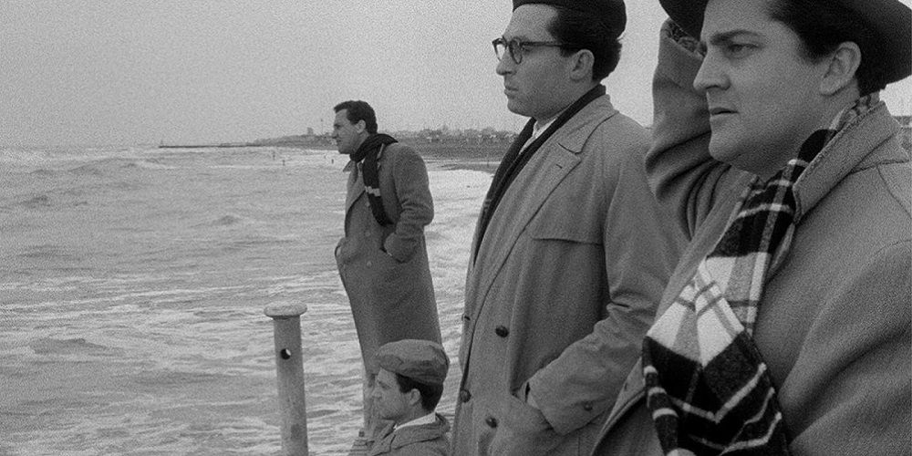 I Vitelloni - Fellini - Actors Alberto Sordi, Franco Interlenghi, Leopoldo Trieste, and Riccardo Fellini gaze out at the sea