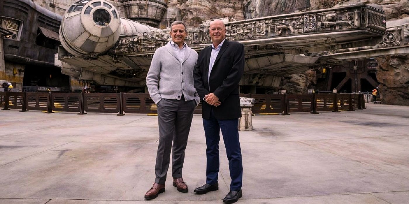 Bob Iger and Bob Chapek posing on a Star Wars set